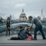 person sitting on floor near people