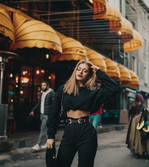 woman standing near people and building during day