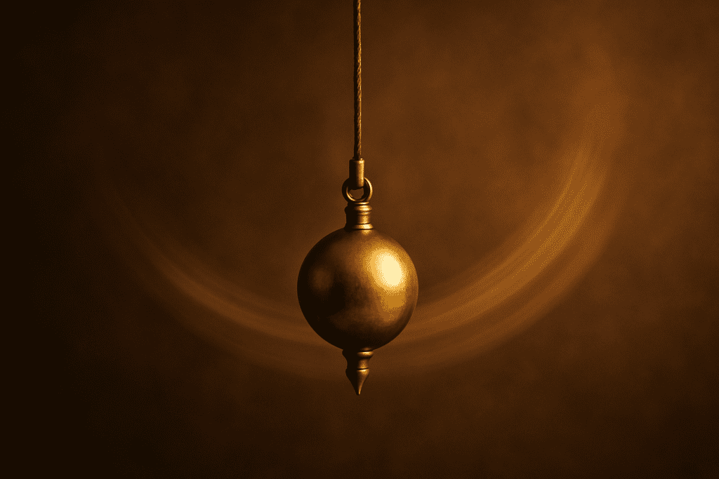A brass pendulum swinging gently in a warmly lit room