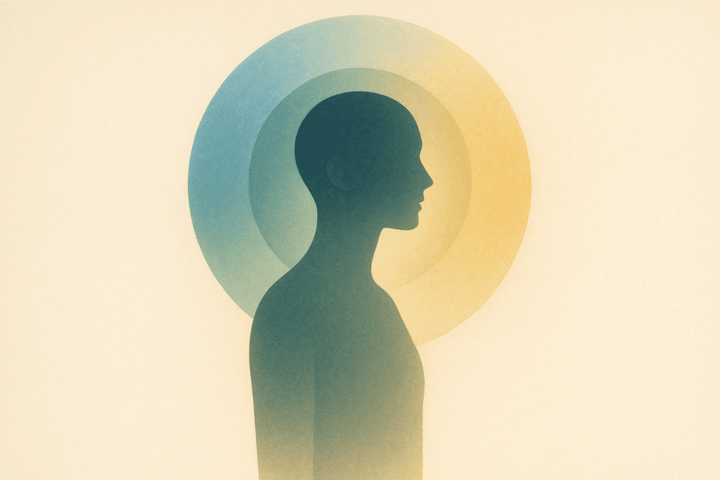 A softly lit person with subtle colour halos suggesting an aura